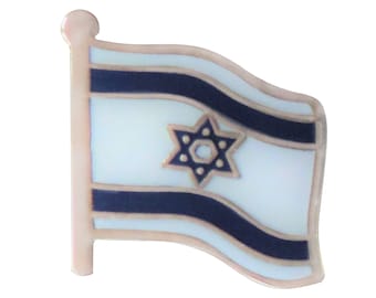 May include: A gold-colored metal pin with a blue and white enamel Israeli flag design. The flag is waving and features a six-pointed star in the center.