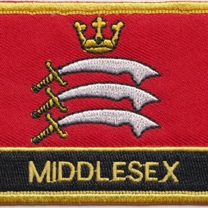May include: A red embroidered patch with a gold border. The patch features a white crown with three silver swords, and the word "MIDDLESEX" in gold lettering on a black background.