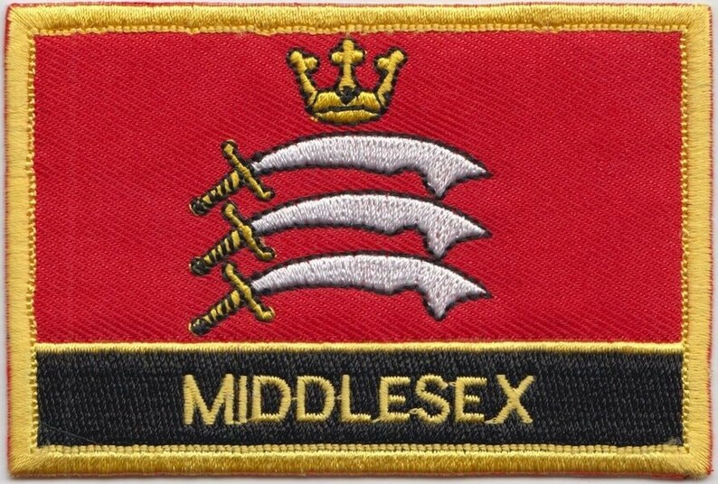May include: A red embroidered patch with a gold border. The patch features a white crown with three silver swords, and the word "MIDDLESEX" in gold lettering on a black background.