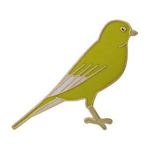 May include: A yellow enamel pin in the shape of a bird. The bird has a white stripe on its wing and a gold outline.