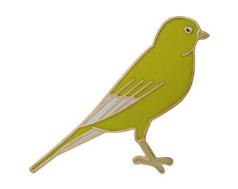 May include: A yellow enamel pin in the shape of a bird. The bird has a white stripe on its wing and a gold outline.