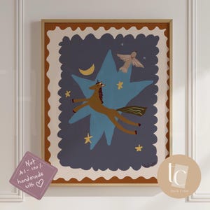 May include: A framed art print featuring a whimsical illustration. A brown horse with a horn flies across a blue star against a dark blue background. A bird, moon, and stars complete the design. The artwork is framed in a light brown border.