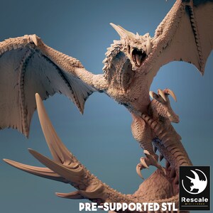 May include: A white dragon miniature with wings spread, in a pre-supported STL format for 3D printing. The dragon is in a mid-air pose with its mouth open, showing sharp teeth. The miniature is designed for tabletop gaming.