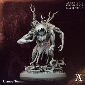 Pode incluir: Uma figura em miniatura cinza detalhada do Urmog Terror 1, uma criatura com vários braços, uma boca grande cheia de dentes e uma coroa de galhos. A figura faz parte da coleção "Ashen Veil Crown of Madness".