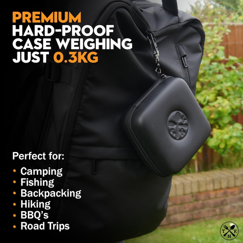 May include: A black hard-shell case with a zipper closure and a logo on the front. The case is attached to a black backpack with a zipper. The text on the case reads "PREMIUM HARD-PROOF CASE WEIGHING JUST 0.3KG". The text below the case reads "Perfect for: Camping, Fishing, Backpacking, Hiking, BBQ's, Road Trips".