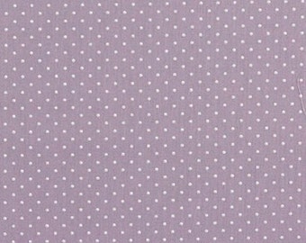 Puede incluir: Primer plano de una tela lavanda con un patrón repetido de pequeños lunares blancos espaciados uniformemente. La tela tiene un acabado suave y mate y una textura sutil. Los lunares están ligeramente en relieve.