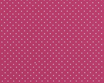 Puede incluir: Una tela rosa con un patrón de lunares blancos.