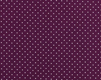 Puede incluir: Primer plano de una tela morada con un patrón de lunares blancos.
