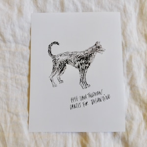 May include: Black and white line drawing of a dog on a white background. The text below the drawing reads "1994: Uma Thurman Dances for Tarantino."