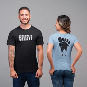 Bigfoot BELIEVE T-Shirt: Distressed Sasquatch Forest Scene Tee