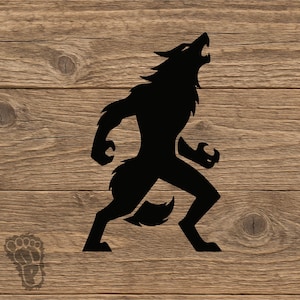 May include: A black silhouette of a werewolf in a dynamic pose, howling with its head tilted back. The creature is depicted with a muscular build and a furry tail. The background is a wooden surface.