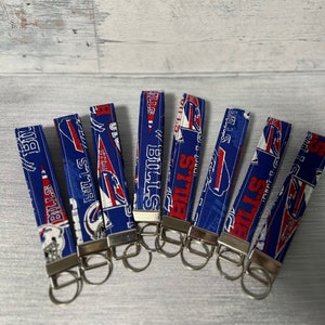 Buffalo Bills key fob keychain. Keychain wristlet. Key fob wristlet. Buffalo Bills gift. Sports keychains. Keychains. Football keychains.