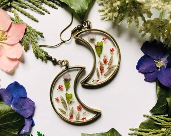 Bronze crescent moon dangle statement earrings with meadow wildflowers flower resin jewellery