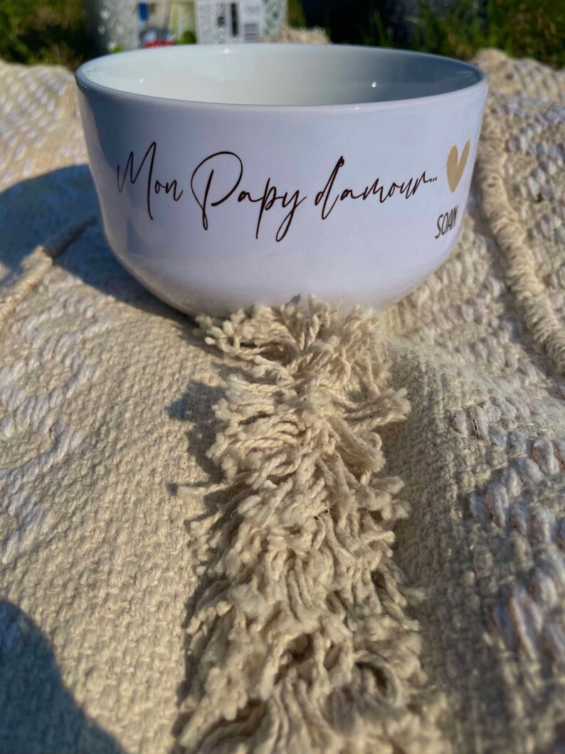 May include: White ceramic bowl with the text "Mon Papy d'amour..." in gold lettering and a gold heart.
