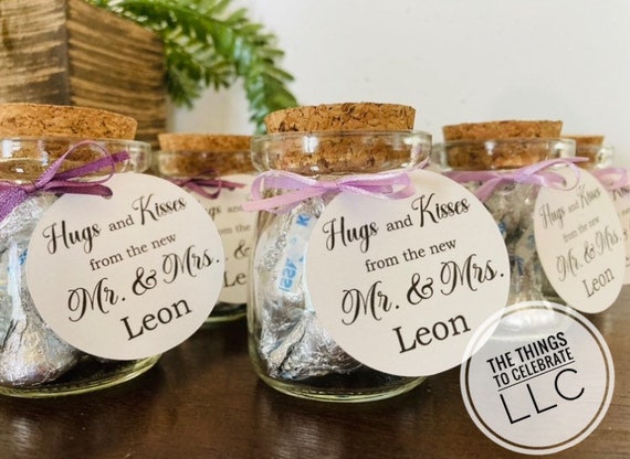 12pcs 4 X 2 Inches Small Glass Favor Jars, Milk Glass Bottles With Cork Lid. 3.4 Oz Party Favors Wedding Favors With 25pcs Label Tags And 20m Burlap Ribbon