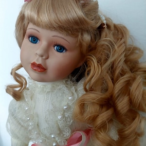 Crowne fine sales porcelain dolls 1998
