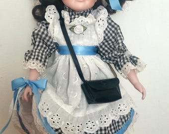 Miss Meggananna a very naughty school doll, fine porcelain, fully restored , spa cleaned  and ready for fine vintage gifting or collecting !