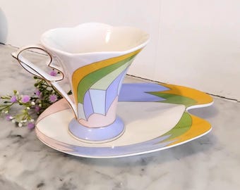 Rarely found Old Tupton, Art Deco inspired cup and Saucer / cake plate. In pristine condition. Collectors item only. Stunningly hand painted