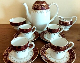 JK Meaken Golden Court beautiful coffee pot set. Red sol 391413. 22k gold assents, will hand painted decorative burgundy bands. 1912-1920