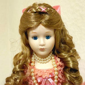 My name I have decided is Princess Cinderella you know. I&#39;m the most Beautiful of dolls. Finest musical box playing a Waltz, wind me up ! x