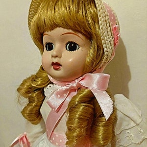 My Name is Ottiline, I am a very pretty bisque Sister doll, im spa cleaned and ready for fine vintage gifting or I can stay at your house !