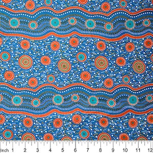 May include: Blue fabric with a repeating pattern of orange, brown, and turquoise circles. The fabric has a white dotted background and a wavy line pattern.