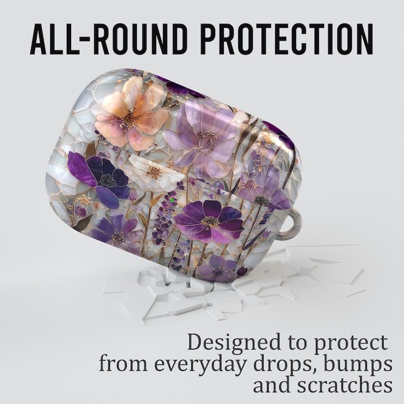 May include: A protective case with a floral design, featuring purple, white, and orange flowers. The text reads "ALL-ROUND PROTECTION" and "Designed to protect from everyday drops, bumps and scratches."