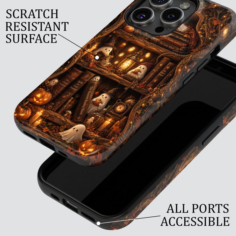 May include: A phone case featuring a detailed illustration of ghosts in a library with pumpkins, books, and candles. The text SCRATCH RESISTANT SURFACE points to the back, and ALL PORTS ACCESSIBLE points to the bottom edge of the black phone case.