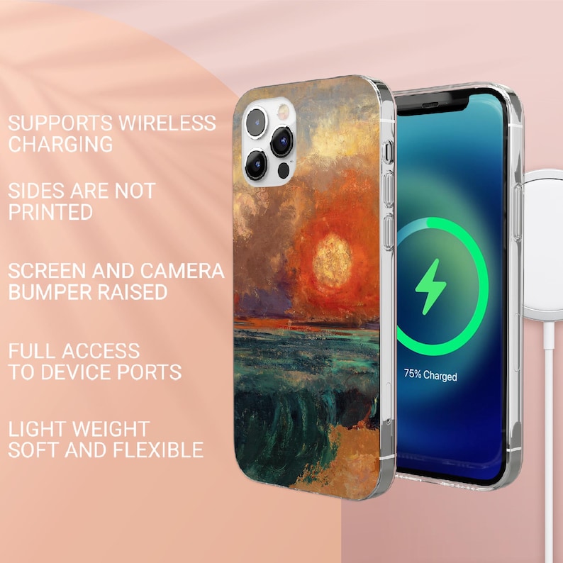 Peut inclure: Une coque de t&eacute;l&eacute;phone transparente avec une peinture color&eacute;e d'un coucher de soleil sur l'oc&eacute;an. La coque est compatible avec la charge sans fil et poss&egrave;de un pare-chocs sur&eacute;lev&eacute; pour prot&eacute;ger l'&eacute;cran et l'appareil photo. Le texte "75% Charged" est visible sur l'&eacute;cran du t&eacute;l&eacute;phone.