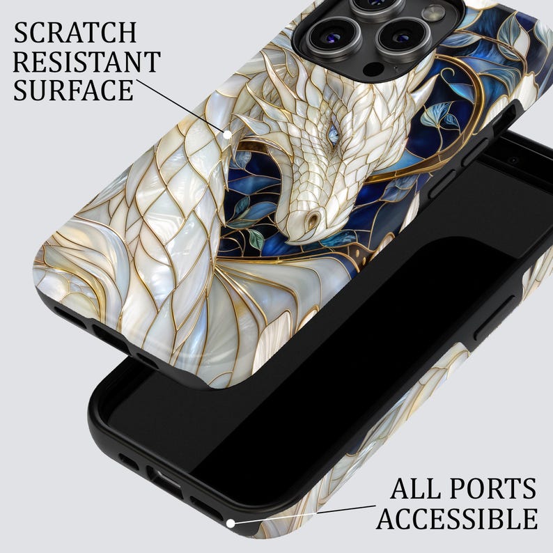 May include: A phone case featuring a white dragon illustration with gold outlines against a dark blue background. The text SCRATCH RESISTANT SURFACE points to the back, and ALL PORTS ACCESSIBLE points to the bottom edge of the black interior frame.