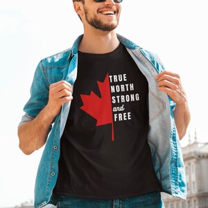 May include: A black t-shirt with a red maple leaf and the text "TRUE NORTH STRONG and FREE".