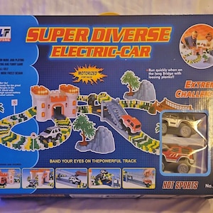 Sällsynt VINTAGE Super Divers Elbilsbana. UTMÄRKT LASTBIL 4X4 Helt ny