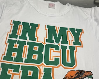 FAMU Collection | HBCU Pride T-Shirts | ‘They Not Like Us,’ ‘Strike,’ ‘Rattler Excellence,’ and More"