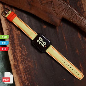 Pu&ograve; includere: Uno smartwatch nero con cinturino in pelle giallo chiaro e bordi arancioni. Il quadrante mostra i numeri "20 16". Il cinturino &egrave; cucito con filo arancione. L'orologio &egrave; su una superficie di legno scuro.