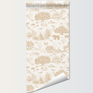 May include: A roll of wallpaper featuring a repeating toile pattern in tan and cream. The design depicts a forest scene with trees, bears, deer, and other wildlife. The wallpaper is unrolled, revealing the pattern.