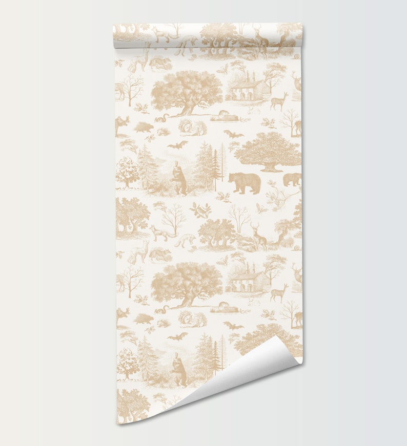 May include: A roll of wallpaper featuring a repeating toile pattern in tan and cream. The design depicts a forest scene with trees, bears, deer, and other wildlife. The wallpaper is unrolled, revealing the pattern.