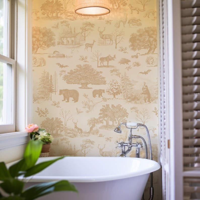 May include: A bathroom with a clawfoot tub and a wallpaper featuring a forest scene with bears, deer, and trees in shades of beige and brown. A window and a light fixture are also visible.