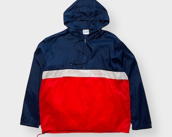 Chaqueta cortavientos adidas vintage de los años 70 y 80 con cremallera 1/4 y bolsillo tipo anorak con capucha ligera