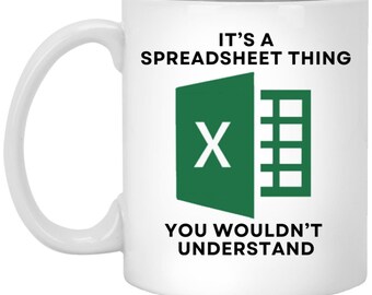 May include: White coffee mug with a green Microsoft Excel logo and the text "It's a spreadsheet thing you wouldn't understand".