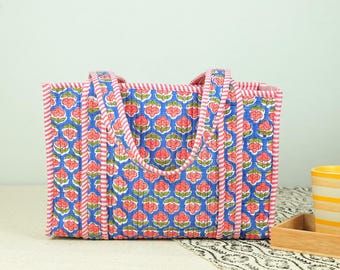 Bolsa para almuerzo de algodón acolchado: estampado floral Buta, tamaño midi.