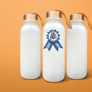 three white water bottles with a gold top and a blue ribbon