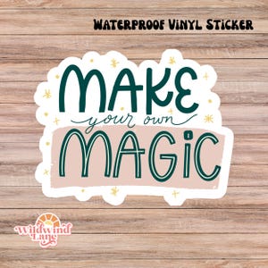 May include: A waterproof vinyl sticker with the words "MAKE your own MAGIC" in teal and white, set against a light pink and white background. The sticker has a whimsical design with star and cross accents, and the text "WATERPROOF VINYL STICKER" is at the top.