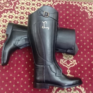Customized leather polo boots.