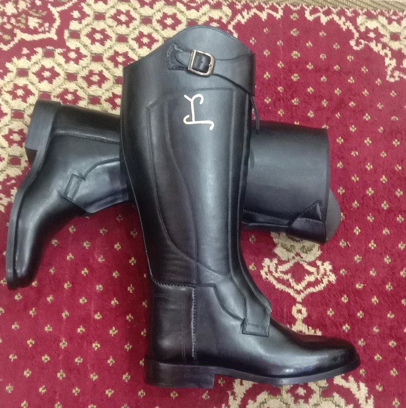 Customized leather polo boots.