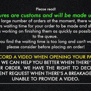 May include: Black and white text on a black background with a green border. The text reads: "Please read! All our figures are customs and will be made upon order. Due to the large number of orders at the moment, there will be up to 40 days waiting time for your order to be made and shipped. Our team is working on finishing them as quickly as possible according to the queue. If you find the waiting time is too long and can't wait, please consider before placing an order! PLEASE RECORD A VIDEO WHEN OPENING YOUR PACKAGE AS PROOF SO WE CAN HELP YOU BETTER WHEN THERE'S AN ISSUE WITH YOUR ORDER. WE HAVE THE RIGHT TO DECLINE YOUR REPLACEMENT REQUEST WHEN THERE'S A BREAKAGE IF YOU'RE UNABLE TO PROVIDE A VIDEO."