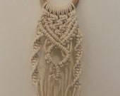 Macrame plant hanger for against a wall