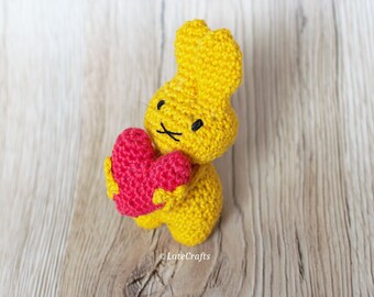 Crocheted bunny amigurumi, small bunny holding a heart, valentine's day themed rabbit plushie