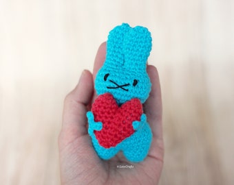 Crocheted bunny amigurumi, small bunny holding a heart, valentine's day themed rabbit plushie