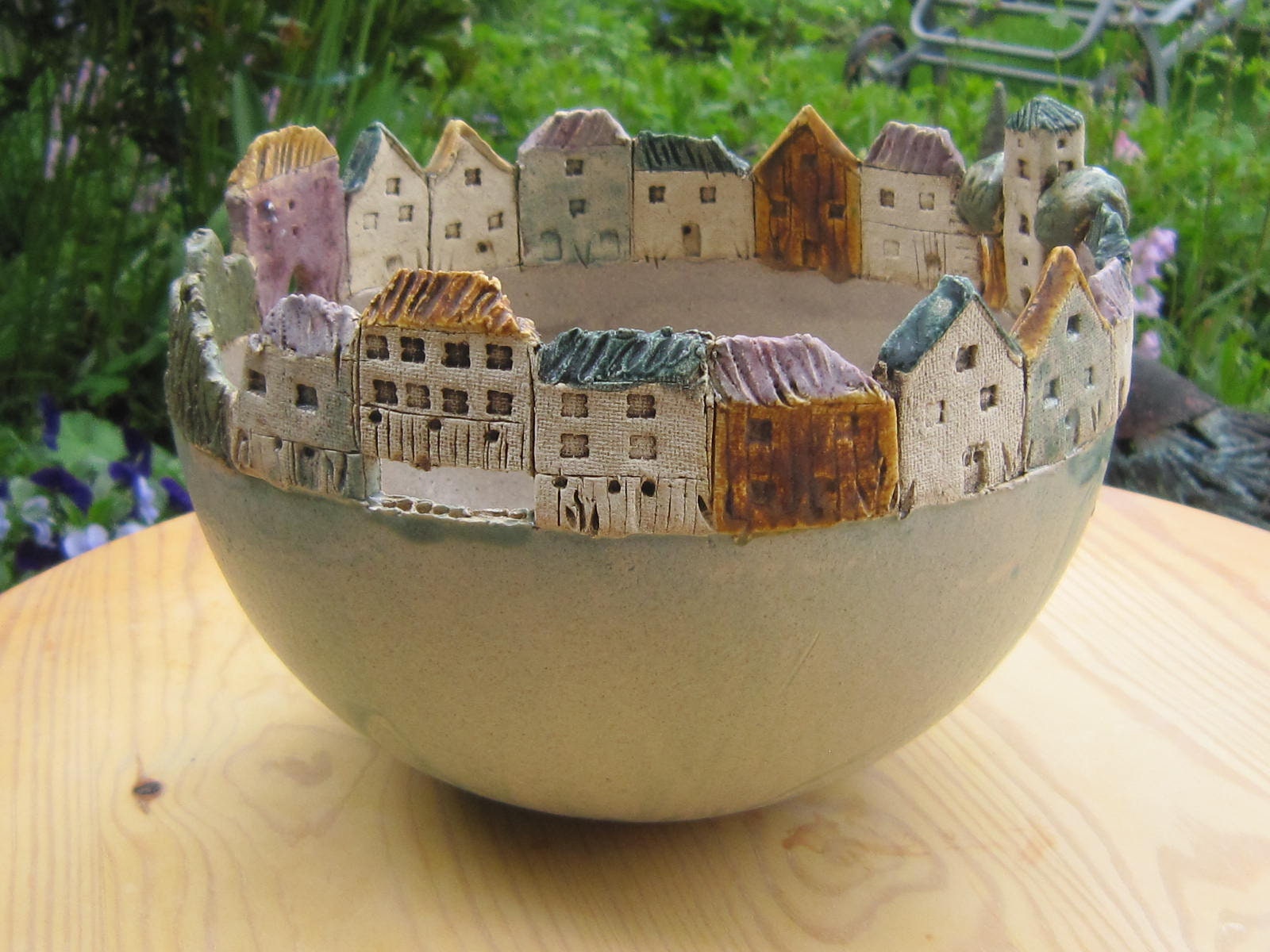 Ceramic bowl "Row of houses", series "Light green with brown tones", various sizes