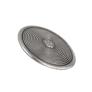 May include: A silver-toned metal button with a circular design featuring concentric circles and a textured center.
